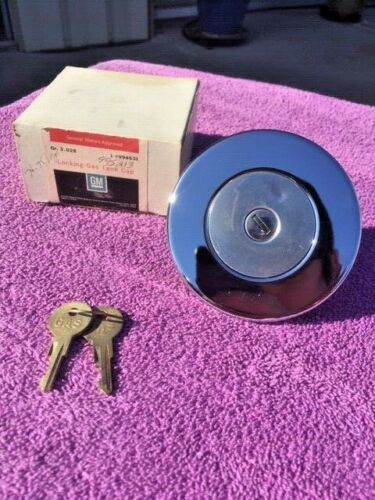 NOS locking gas cap with keys for 1974 1975 Chevrolet Vega Monza part numbers 994631 995213 OEM fuel cap
