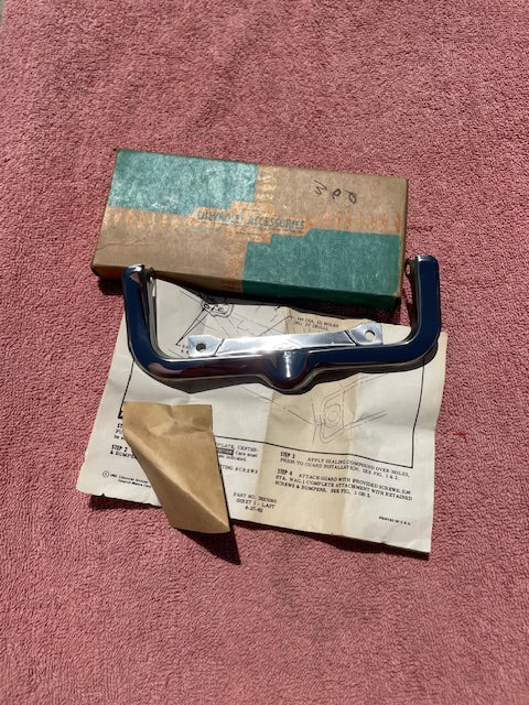 NOS gas door guard for 1963 1964 Chevrolet station wagon part number 985489 OEM fuel filler protection trim