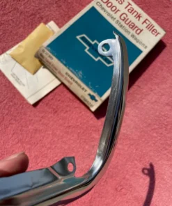 Alternative view of 1965 1966 Chevrolet Station Wagon NOS Accessory Trim Gas Door Guard #986241