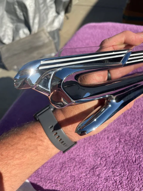 NORS flying lady hood ornament with Lucite insert for 1940 Chevrolet vintage front hood trim accessory with imperfections