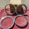 NOS take-off 13 inch wheel trim rings set for 1980 to 1982 Chevrolet Nova Citation part number 475190 OEM wheel trim accessory