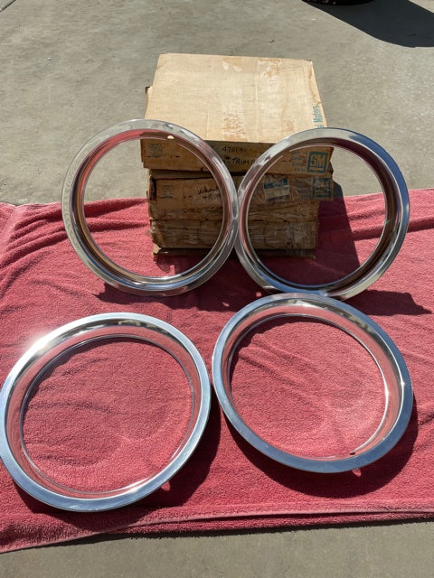NOS take-off 13 inch wheel trim rings set for 1980 to 1982 Chevrolet Nova Citation part number 475190 OEM wheel trim accessory