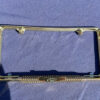 NORS gold bowtie license plate frame for 1958 Chevrolet Bel Air Biscayne Delray vintage rear accessory chrome finish