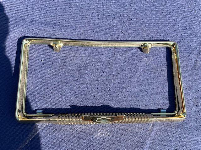 NORS gold bowtie license plate frame for 1958 Chevrolet Bel Air Biscayne Delray vintage rear accessory chrome finish
