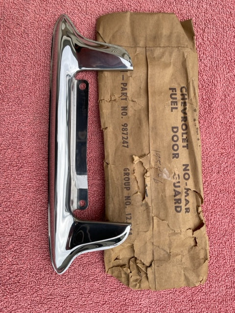 NOS gas door filler guard trim for 1955 to 1959 Chevrolet GMC panel truck suburban part number 987247 OEM fuel door protection trim