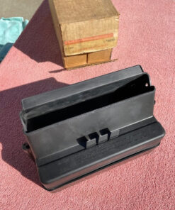 NOS underseat litter trash container for 1970s Chevrolet GM power seat models part number 981935 OEM interior storage accessory