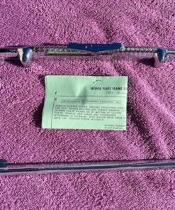 NORS bowtie license plate frame for 1957 Chevrolet Bel Air 210 150 vintage Chevy rear trim accessory