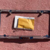 NORS bowtie license plate frame for 1958 Chevrolet Bel Air Biscayne Delray classic Chevy accessory vintage rear trim