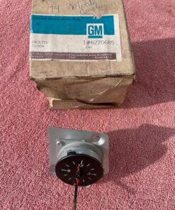 NOS round dash clock for 1973 1974 1975 Chevrolet Chevelle Monte Carlo part number 6270685 OEM interior time gauge
