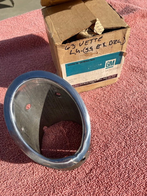 NOS LH rear exhaust tip bezel trim for 1963 Chevrolet Corvette C2 Sting Ray part number 3826941 OEM driver side rear exhaust trim