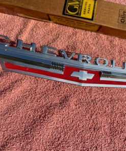 Alternative view of 1962 Chevrolet Chevy II 2 Nova 4 6 300 Standard NOS Hood Lip Emblem #3792812
