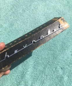 Alternative view of 1955 1956 Chevrolet 150 210 NOS Dash "Chevrolet" Speaker Emblem Script