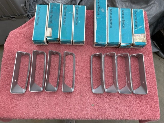 NOS front fender louver set for 1969 Chevrolet Corvette C3 Stingray part numbers 3945247 and 3945248