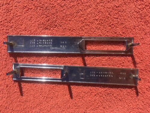 1969 Chevrolet Chevelle Malibu 307 NOS Front Fender Side Marker Emblem Trim Pair Part Numbers 3945291 and 3945252 genuine GM restoration trim components for classic Chevrolet Chevelle applications.