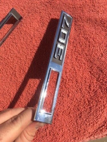 1969 Chevrolet Chevelle Malibu 307 NOS Front Fender Side Marker Emblem Trim Pair #3945291 / 3945252 - Image 7