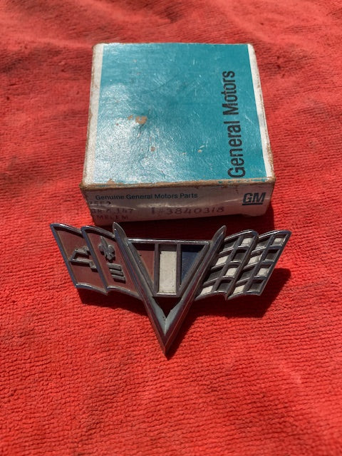 1965–1967 Chevrolet Impala V8 Front Fender V Flag Emblem GM Part Number 3840318 Original Used Classic Chevrolet Trim Piece.