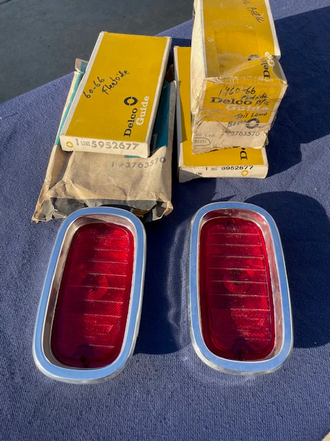 1960-1966 Chevrolet Fleetside Pickup Truck NOS Tail Light Lamp Lens + Bezel Pair #5952677 / 3763570