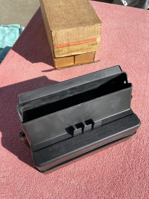 1970s Chevrolet GM NOS power seat underseat litter trash container part number 981935 original factory accessory for classic Chevrolet restoration and collector vehicle projects.