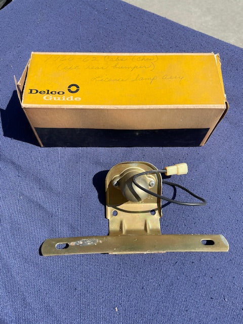1960-1962 Chevrolet TILT CAB COE Truck NOS License Plate Light Bracket #899260