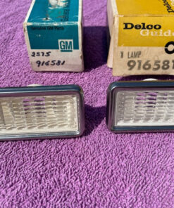 Alternative view of 1968 Chevrolet Corvette, Camaro, Corvair, Impala NOS Front Clear Side Marker Lens Bezels #916581