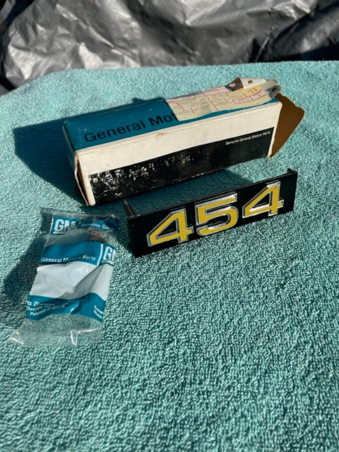 Genuine 1975–1976 Chevrolet Pickup Truck NOS 454 Grille Emblem Part Number 357286 Cast Number 343992 for C10 C20 and C30 Big Block Trucks.