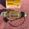 1966-1971 Chevrolet NOS Delco GUIDE License Plate Lamp Lens Assembly #910967