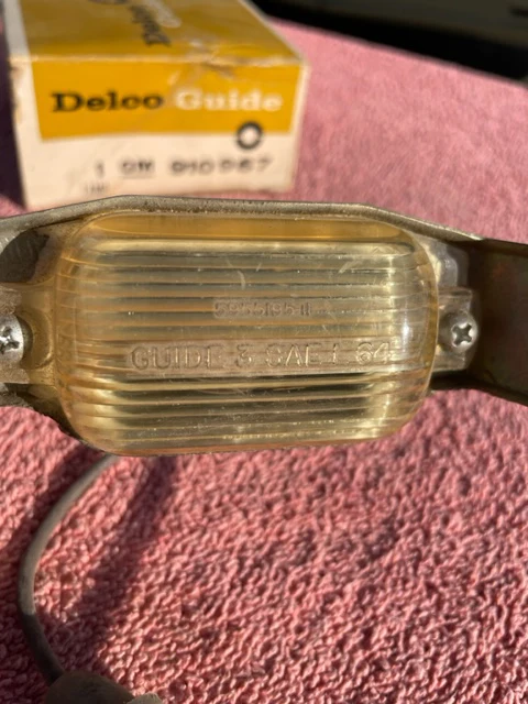 1966-1971 Chevrolet NOS Delco GUIDE License Plate Lamp Lens Assembly #910967 - Image 3