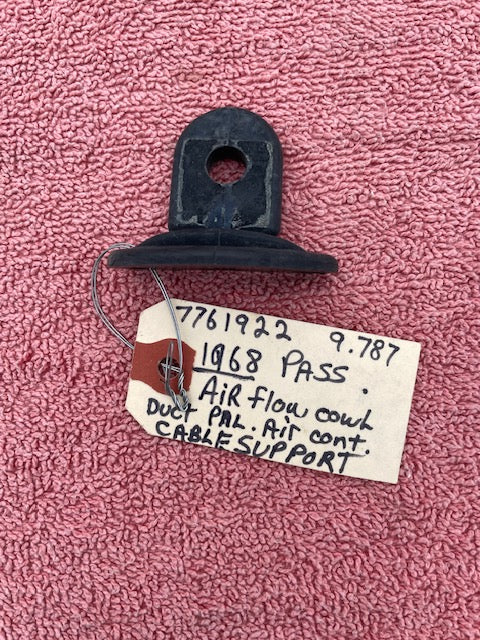 1968 Chevrolet Impala Bel Air NOS AC air duct cable support bracket part number 7761922 original GM HVAC mounting component for factory-correct restoration and repair projects.