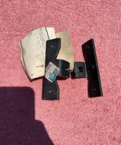 1958 1966 Chevrolet Fleetside Pickup Truck NOS tailgate latch pivot bracket pair part number 3753039 original GM tailgate hardware for classic Chevrolet truck restoration projects.