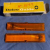 1963-1964 Chevy II / Nova NOS AMBER Park Light Lamp Turn Signal Indicator Lens Pair #5954493 / 5954494