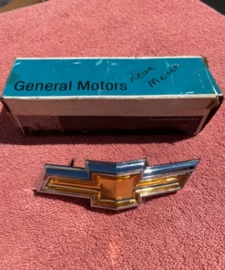 1974 Chevrolet Impala and Bel Air NOS Bowtie Grille Emblem Part Number 6260819 genuine GM New Old Stock front grille emblem for classic Chevrolet restoration projects